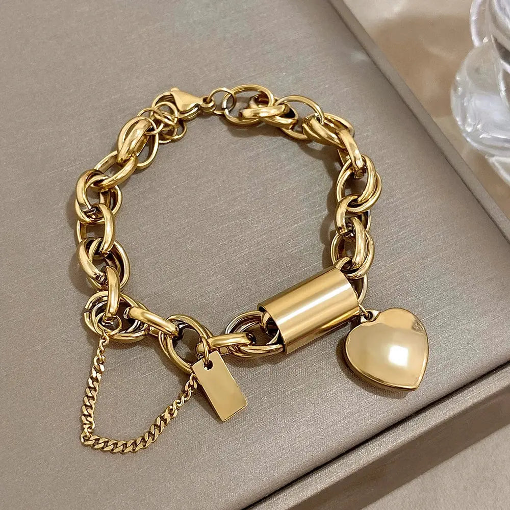 Add a Touch of Luxury with Our Exquisite DZ Fashion Design Gold Color Thick Chain Stainless Steel Bracelets NNOS