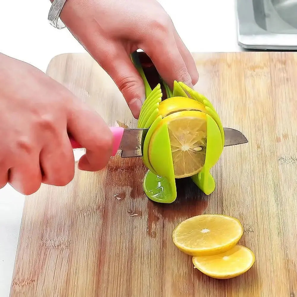 Slice like a pro! 🍊🍅 Upgrade your kitchen with this stainless steel handheld citrus and tomato slicer! #KitchenGadgets #CookingEssentials