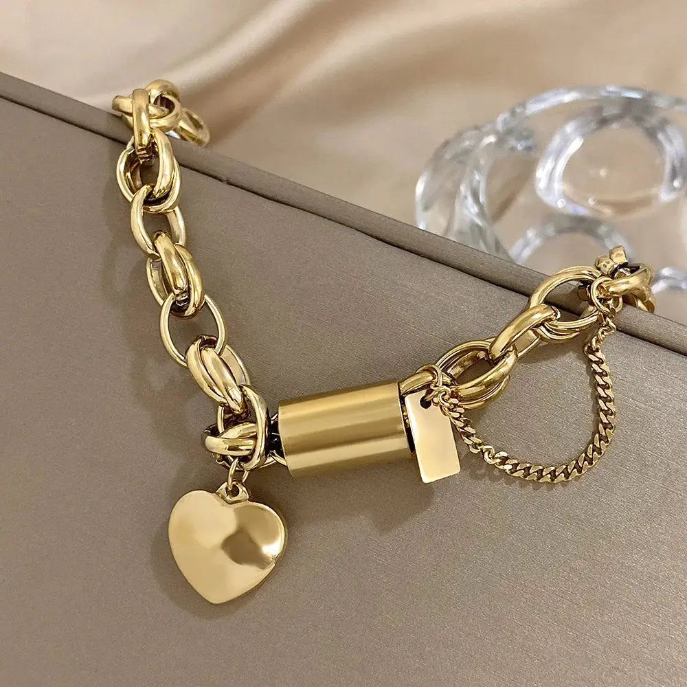 Add a Touch of Luxury with Our Exquisite DZ Fashion Design Gold Color Thick Chain Stainless Steel Bracelets NNOS