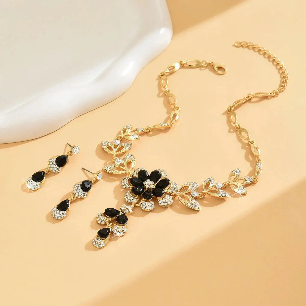 "3 Snazzy Bling Blings: Camellia Water Drop Earrings & Necklace Set for When You Want to Dazzle at Weddings or Just Impress Your Cat!"