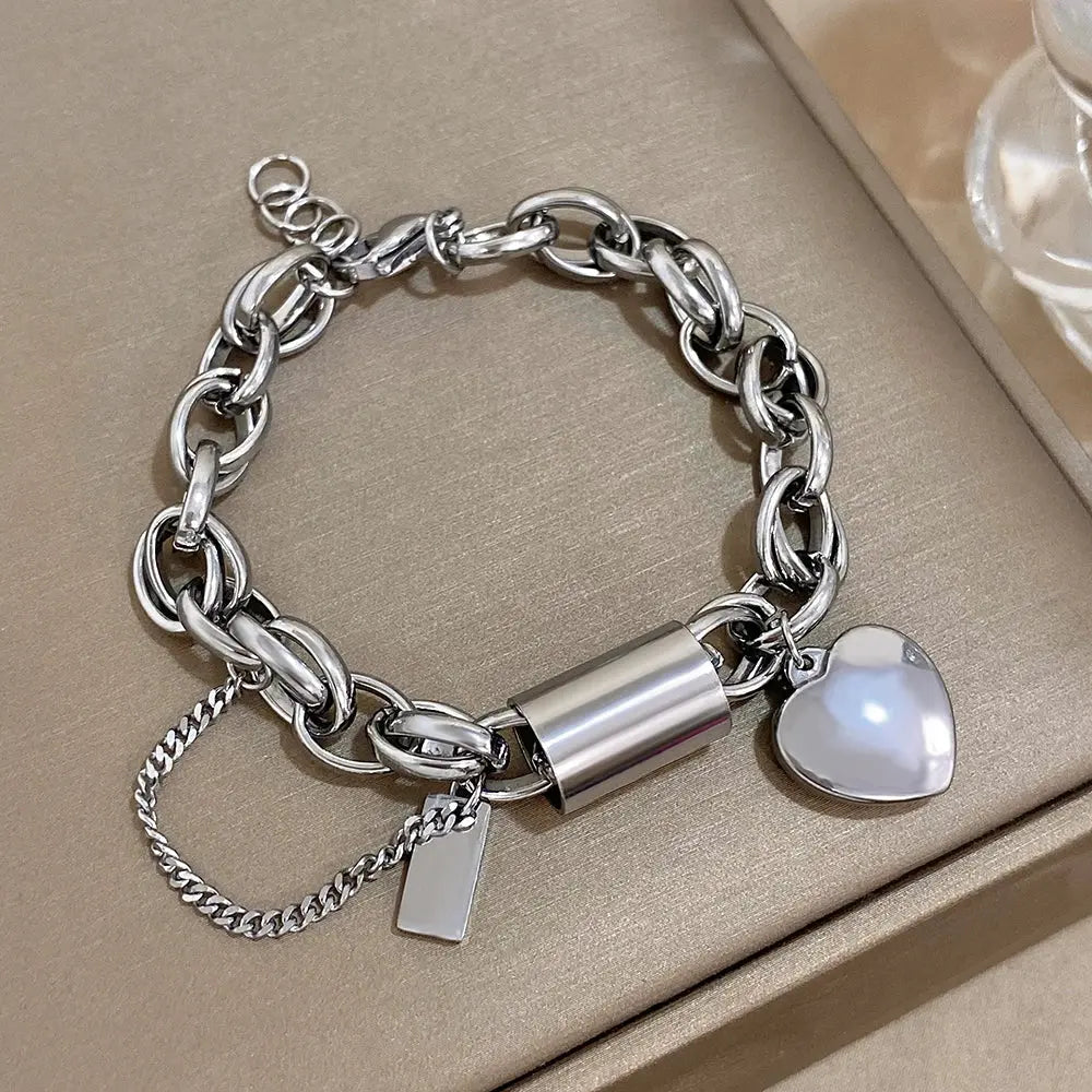 Add a Touch of Luxury with Our Exquisite DZ Fashion Design Gold Color Thick Chain Stainless Steel Bracelets NNOS