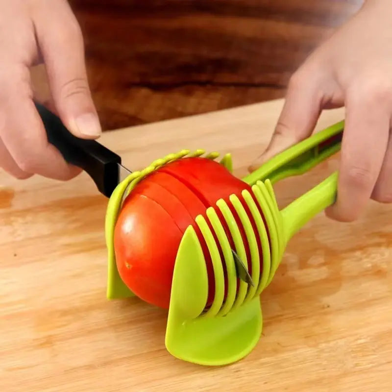 Slice like a pro! 🍊🍅 Upgrade your kitchen with this stainless steel handheld citrus and tomato slicer! #KitchenGadgets #CookingEssentials product image